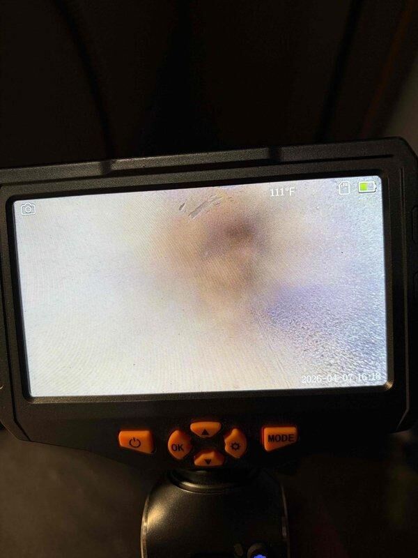 Responded to no heat call and diagnosed failed blower motor that was seized and making squealing noise. Used inspection camera to verify internal motor damage and confirmed complete motor failure. Replaced defective blower motor and restored heating operation to system.
