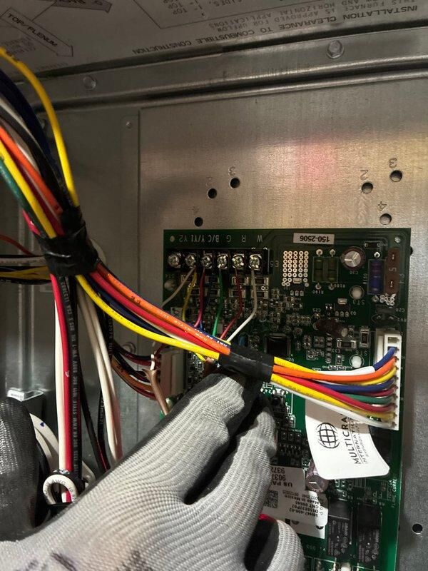 Completed installation of Ameristar 60,000 BTU 80% efficient single stage furnace in basement utility area. Installed and wired control boards, connected all electrical components, verified blower motor operation, routed condensate drain piping, and performed system diagnostics confirming unit operational at 48.9 degrees temperature differential.