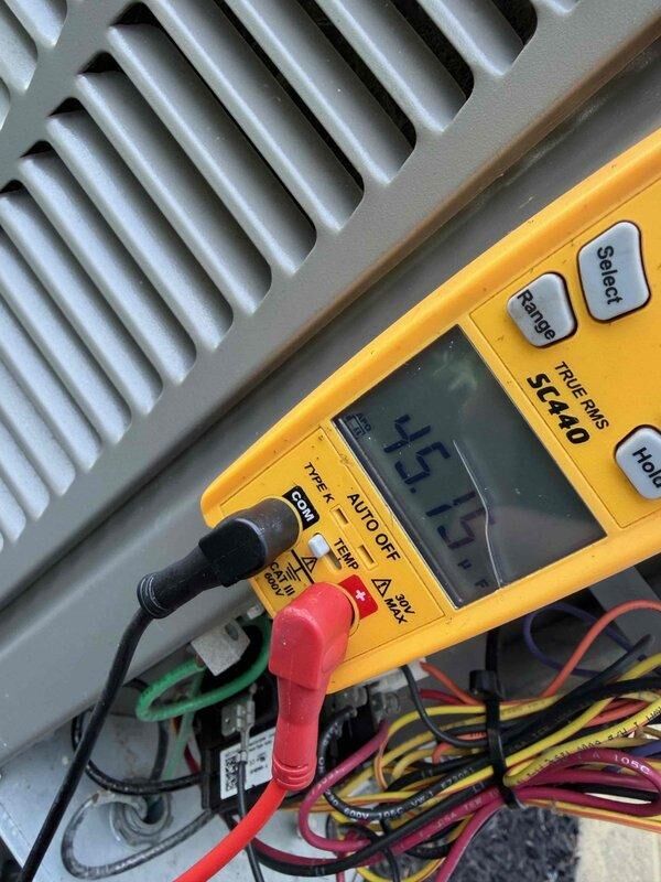 Completed scheduled cooling maintenance member visit on commercial HVAC system. Performed comprehensive inspection of mechanical components including compressor assembly, electrical connections, and control systems. Verified system operation with multimeter readings showing 45.19 volts at control circuit, indicating proper electrical function. Documented equipment condition including normal wear patterns on mechanical linkages and compression spring assembly.
