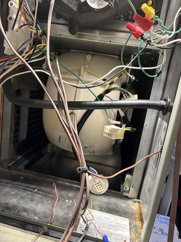 Returned to replace warranty blower motor in HVAC system. Documented electrical connections and component configuration with photos prior to removal. New motor has been ordered through supplier with delivery expected tomorrow; customer was instructed to return the three space heaters upon completion of repair.