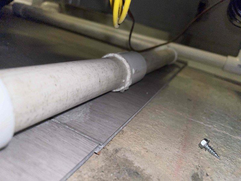 Responded to customer report of water leak in HVAC room where customer had proactively shut off humidifier. Inspection revealed condensate line issue at the connection point with visible water damage on floor. Sealed joint with appropriate compound and verified proper drainage function to resolve the leak.
