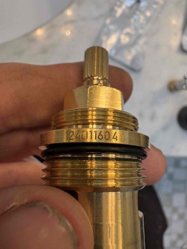 Returned to property to replace shower pressure control stem with correct cartridge (part #124011604) for rain shower system. Successfully installed customer-supplied component, resolving previous water pressure issue. Completed final testing to verify proper operation.