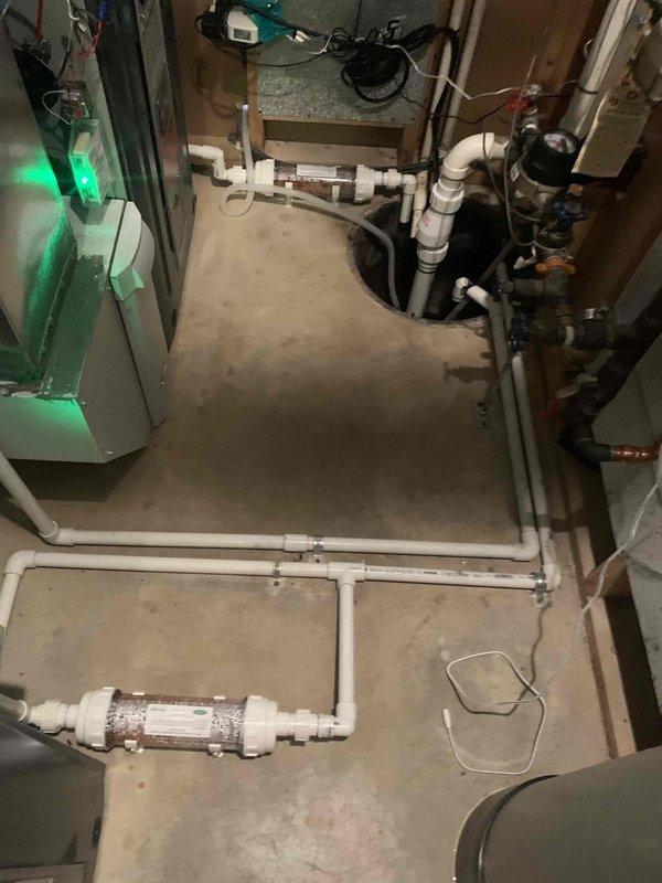 Responded to water leak concern at HVAC system. Performed leak detection and identified condensate drain issue. Replaced clogged air filter with new one to restore proper system function and prevent future condensation problems.
