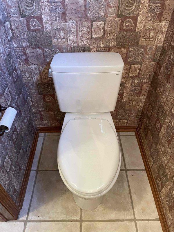 Performed follow-up service to complete Toto toilet installation. Properly secured toilet to floor, connected water supply line, and verified proper operation. Additionally, cleared clogged sink drain to restore proper drainage function.