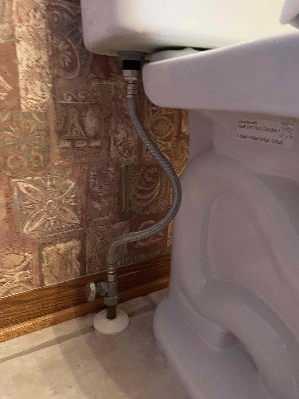 Performed follow-up service to complete Toto toilet installation. Properly secured toilet to floor, connected water supply line, and verified proper operation. Additionally, cleared clogged sink drain to restore proper drainage function.