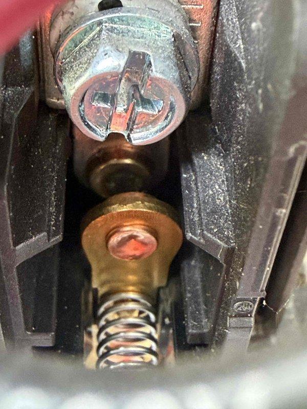 Completed scheduled cooling maintenance member visit on commercial HVAC system. Performed comprehensive inspection of mechanical components including compressor assembly, electrical connections, and control systems. Verified system operation with multimeter readings showing 45.19 volts at control circuit, indicating proper electrical function. Documented equipment condition including normal wear patterns on mechanical linkages and compression spring assembly.
