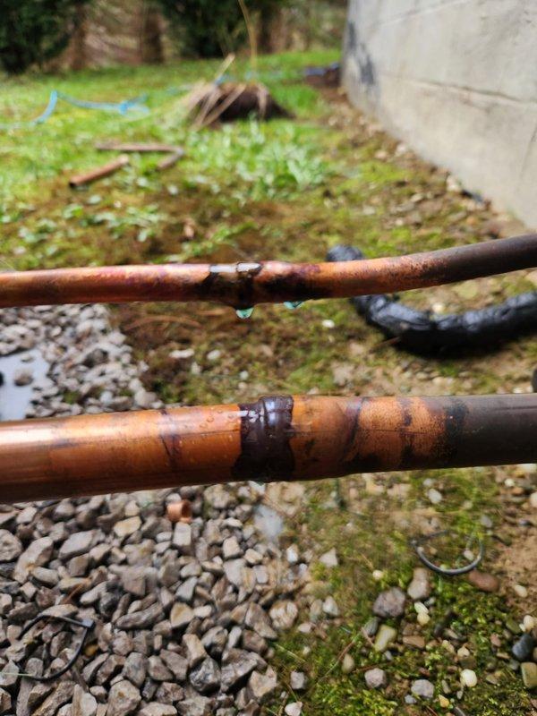 Returned to address installation issues on HVAC system. Replaced outdoor coil due to severe corrosion and deterioration on copper piping. Installed pan heater as required. Removed shipping bracket from under sound blanket on compressor that had been left in place during initial installation. Completed system startup and verified proper operation of all components.