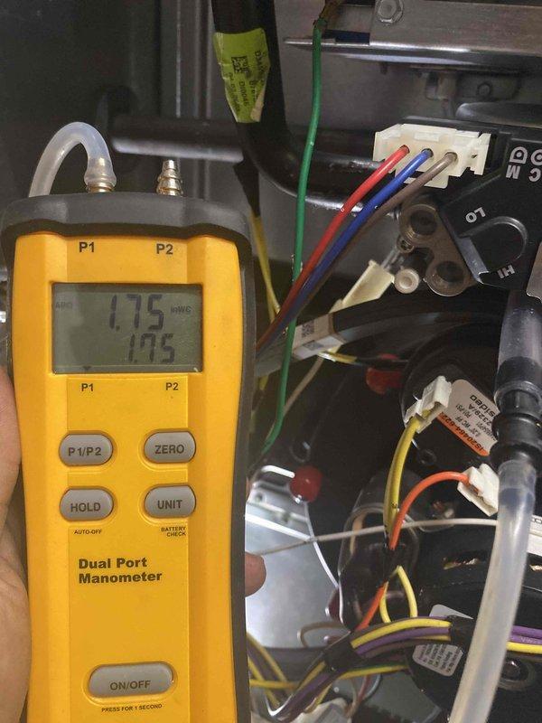 Returned to property to replace defective gas valve under warranty. Removed and replaced faulty gas valve assembly, verified all electrical connections, and tested system operation. Performed combustion analysis using manometer to confirm proper gas pressure readings at 1.15 INWC, ensuring safe and efficient operation of heating unit.