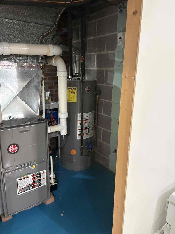 Conducted estimate for relocating air handler from rear of residence to side location per customer request. Assessed existing ductwork system including galvanized metal supply and return ducts, evaluated current mechanical room configuration with Rheem furnace and water heater, and documented existing conditions to determine scope of work for repositioning equipment and modifying duct runs accordingly.