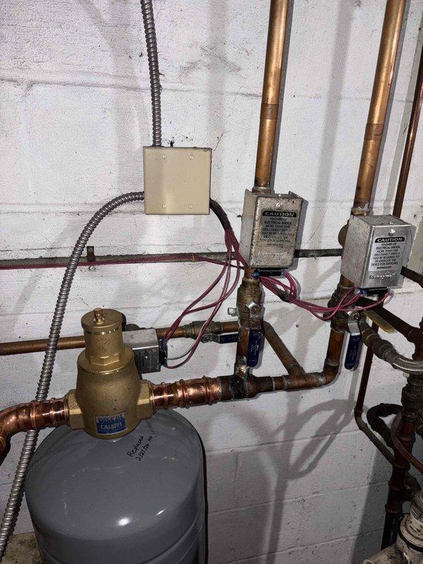 Completed estimate for indirect water heater installation and boiler system upgrade. Assessed existing hydronic heating infrastructure including expansion tank, pressure relief components, copper piping network, and multiple zone valves. Evaluated current system configuration with aged copper lines, brass fittings, and pressure regulation equipment mounted on utility room wall. Provided pricing options for indirect water heater integration with existing boiler system, including necessary piping modifications, electrical connections, and safety controls. Customer will be available for installation scheduling after 4 PM. Lead transferred for buyback program consideration.