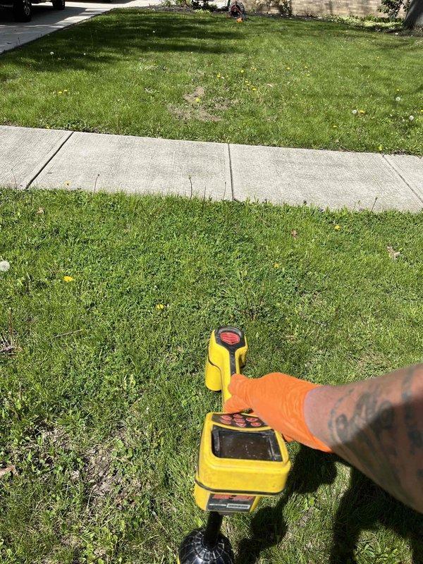 Performed sewer line camera inspection on 1969-built residential property using exterior clean-out access point located in front yard. Utilized electronic locating equipment to map underground plumbing infrastructure and assess condition of main sewer line. Inspection revealed current status of drainage system, with documentation captured for property records and future reference.