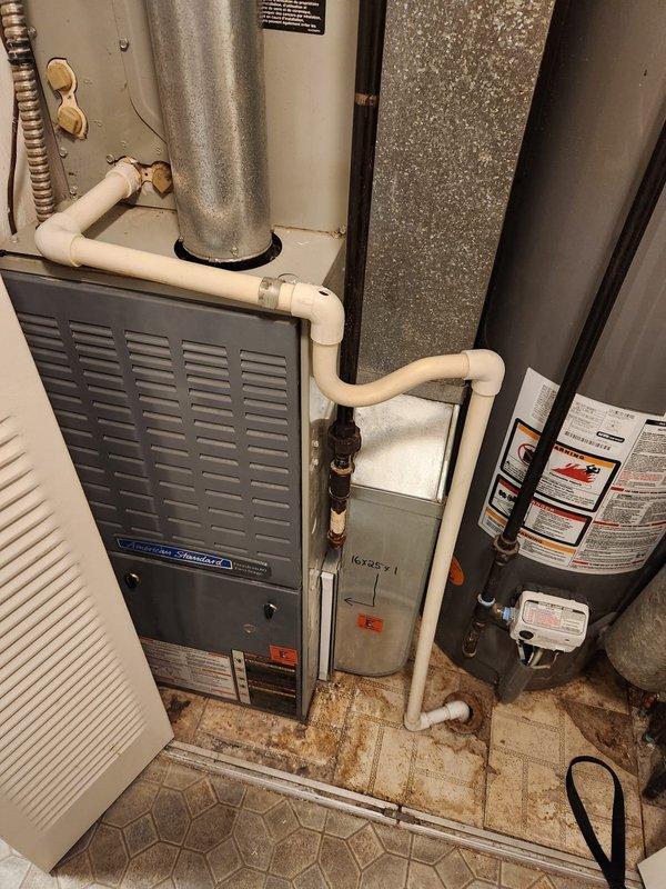 Completed comprehensive tune-up service on American Standard furnace and air conditioning system. Performed standard maintenance procedures, system diagnostics, and temperature verification readings. Assessed utility closet equipment layout including disconnected condensate pump requiring customer consultation for proper reconnection or removal.