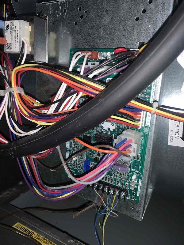 Completed cooling maintenance club visit on residential HVAC system. Performed electrical diagnostics using calibrated multimeter, recording voltage reading of 243.2V at the unit. Inspected internal control boards and verified proper wiring connections throughout the system, including low-voltage thermostat circuits and main power distribution. All components operating within normal parameters with no deficiencies noted.